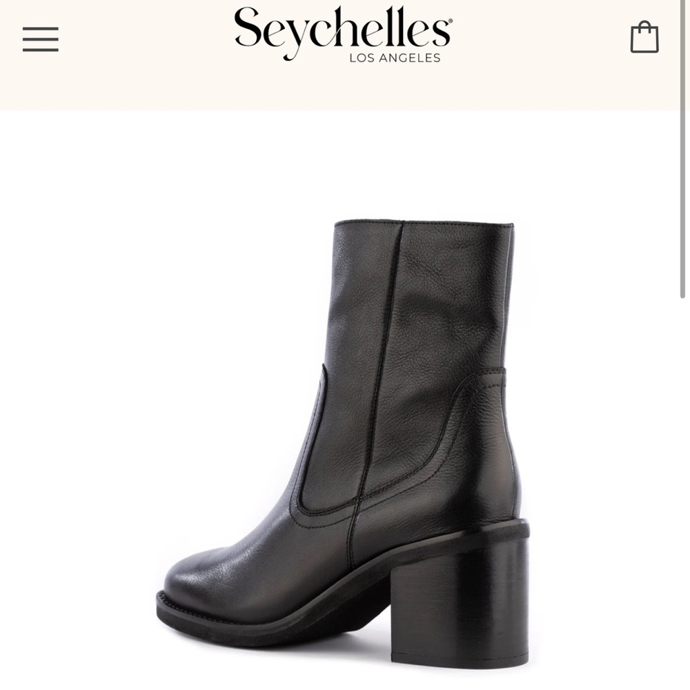 Seychelles high ankle boot. Very unique with the brown sole and black boot!